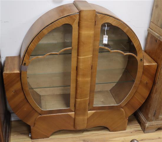 An Art Deco display cabinet W.135cm